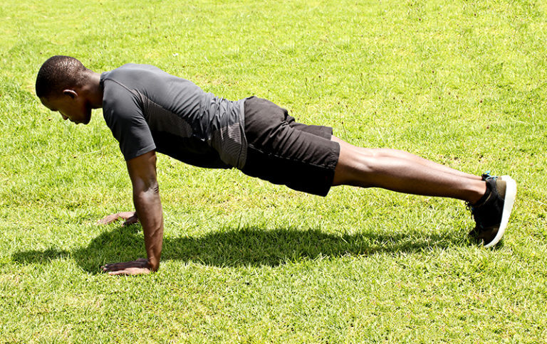 Man Doing Push Ups Outdoors on Grass - High Quality Free Stock Images Man Doing Push Ups Outdoors on Grass - High Quality Free Stock Images